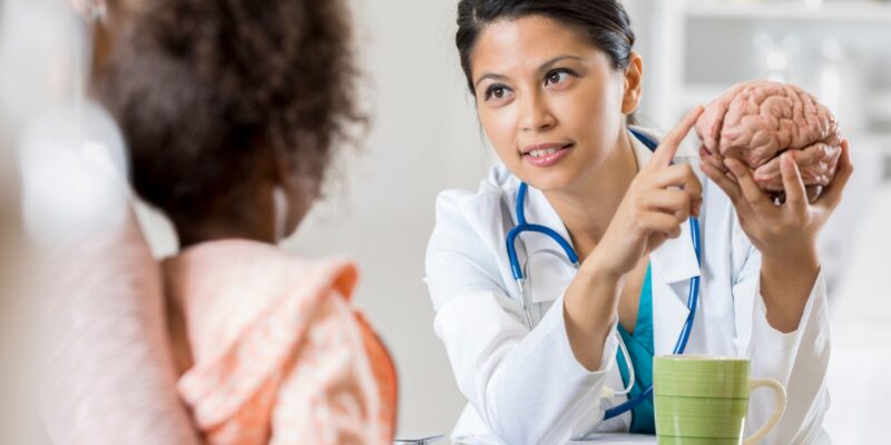 Pediatric Neurologist Supporting Children