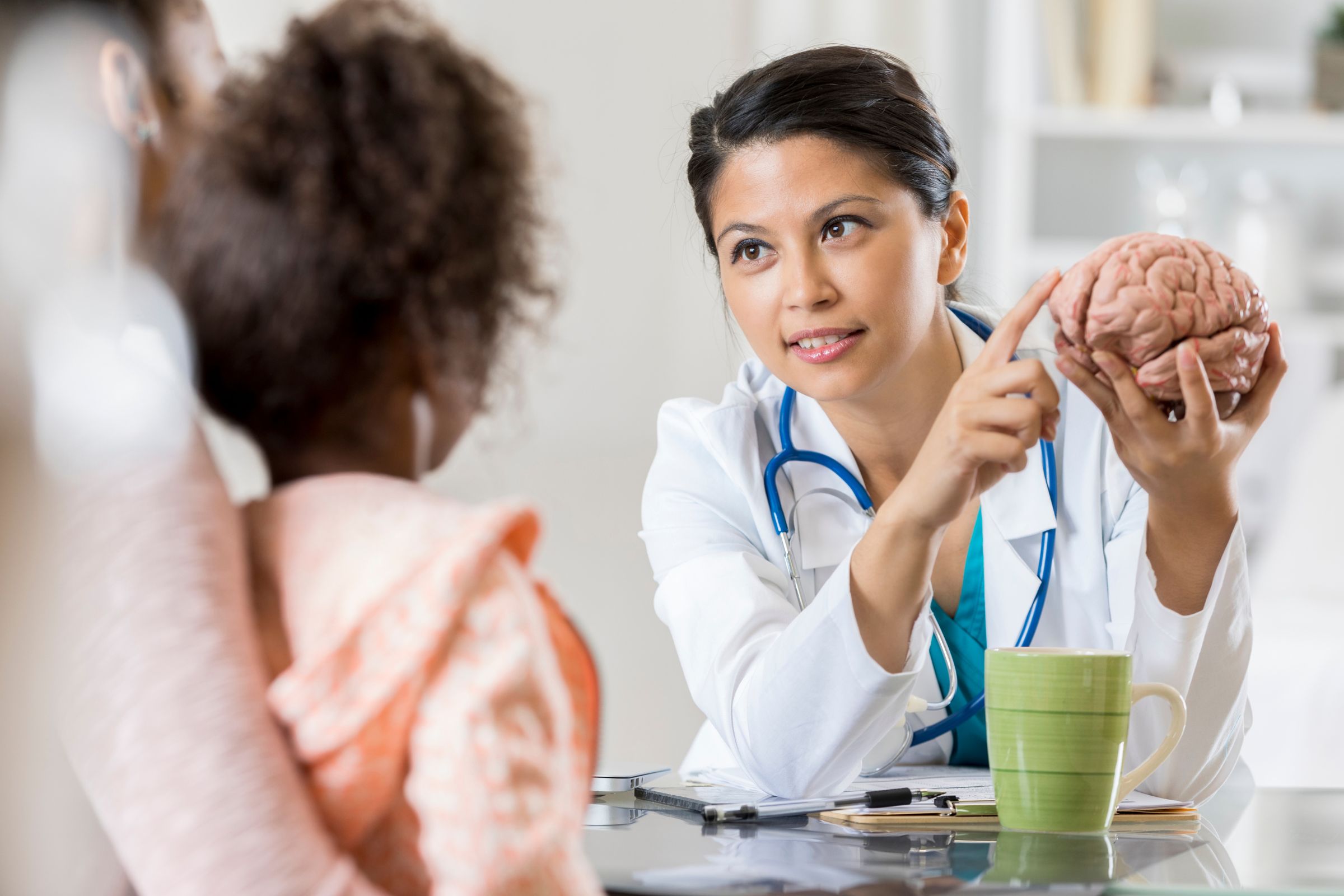 Pediatric Neurologist Supporting Children